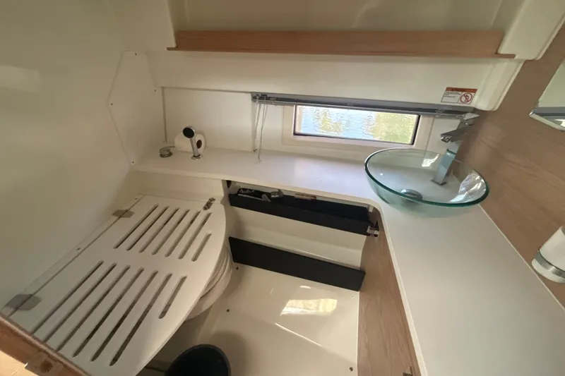 Slide: The Image of Interior of 2024 Quarken 35 Cabin Tourer bathroom with modern sink and compact design. - 25