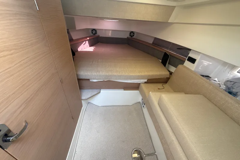 Slide: The Image of Interior of 2024 Quarken 35 Cabin Tourer with cozy seating and modern design. - 21