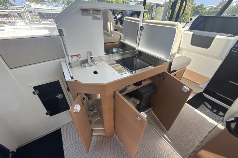 Slide: The Image of Interior view of 2024 Quarken 35 Cabin Tourer showcasing modern kitchen amenities. - 14