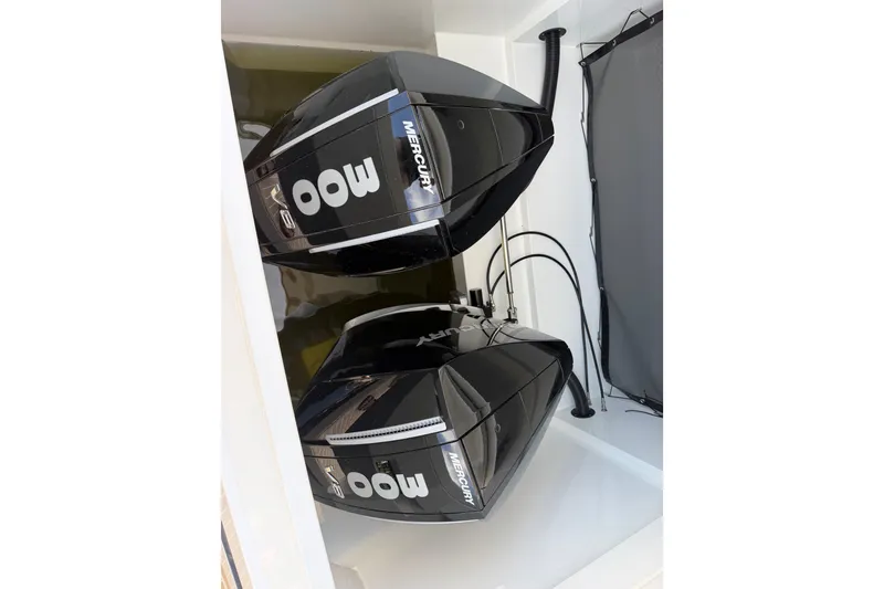 Slide: The Image of Twin Mercury outboard engines on 2027 De Antonio Yachts D32 boat. - 20