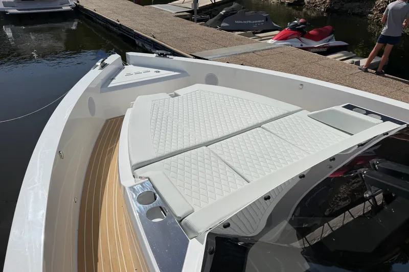 Slide: The Image of Luxury De Antonio Yachts D32 (2027) with sleek deck design and comfortable seating. - 10