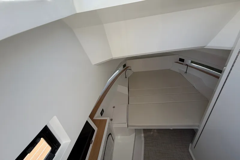 Slide: The Image of Interior cabin of 2027 De Antonio Yachts D32, featuring sleek design and comfortable seating. - 18