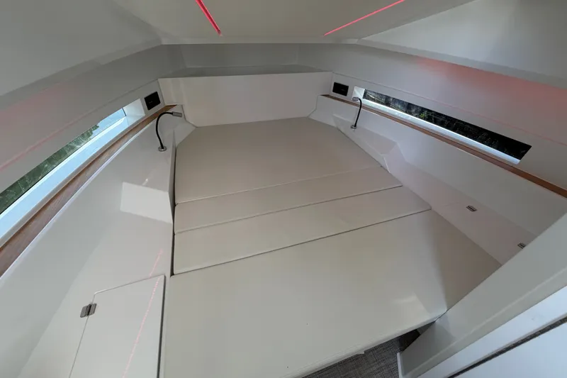 Slide: The Image of Interior cabin of 2027 De Antonio Yachts D32, featuring sleek design and modern lighting. - 16