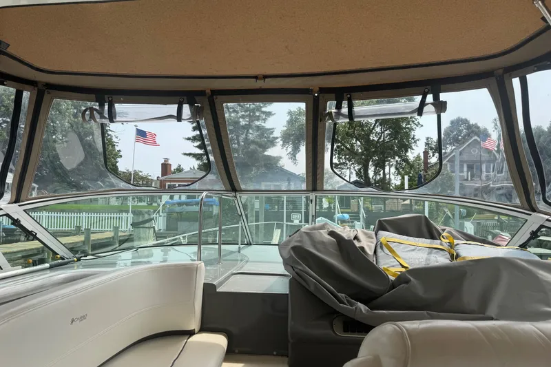 Slide: The Image of Interior view of 2006 Cruisers Yachts 370 Express with American flag in background. - 38