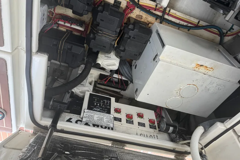 Slide: The Image of Electrical components and wiring inside a 2006 Cruisers Yachts 370 Express boat. - 36