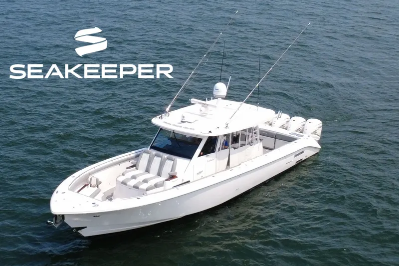 The Image of 2023 Everglades 455 Center Console boat on water, featuring Seakeeper stabilization. - 0
