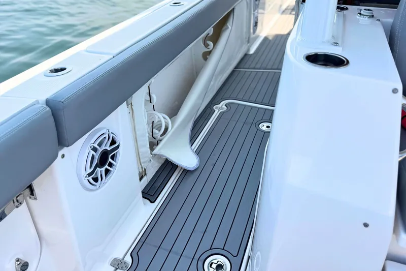 Slide: The Image of 2023 Everglades 455 Center Console boat interior with sleek seating and modern design. - 60