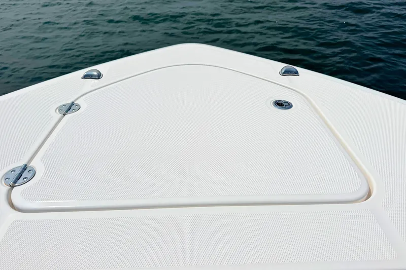 Slide: The Image of Bow of 2023 Everglades 455 Center Console boat on water. - 52