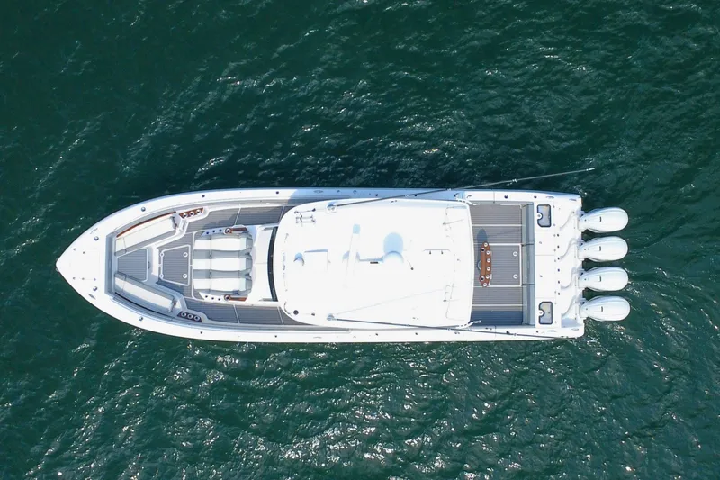 Slide: The Image of Aerial view of 2023 Everglades 455 Center Console boat on water. - 10
