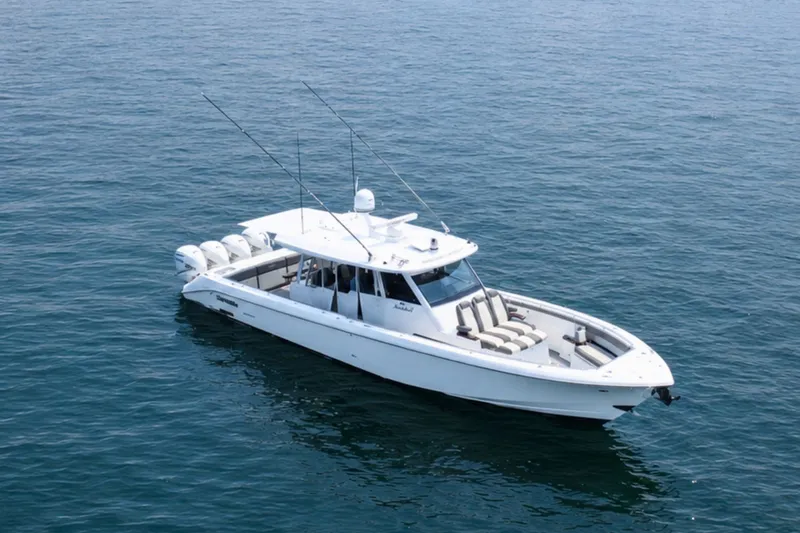 Slide: The Image of 2023 Everglades 455 Center Console boat on open water. - 4