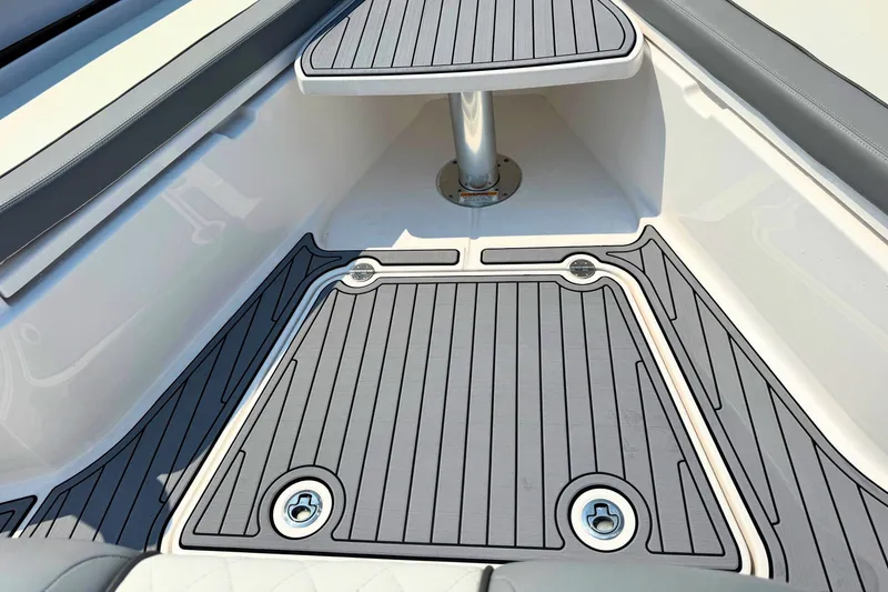 Slide: The Image of 2023 Everglades 455 Center Console boat deck with sleek, modern design and durable flooring. - 54