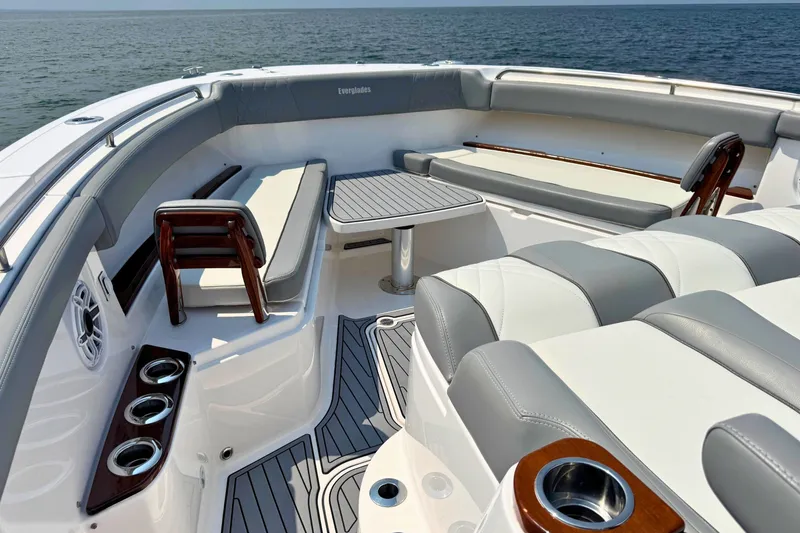 Slide: The Image of Luxurious seating area on 2023 Everglades 455 Center Console boat, featuring elegant design and ocean view. - 45