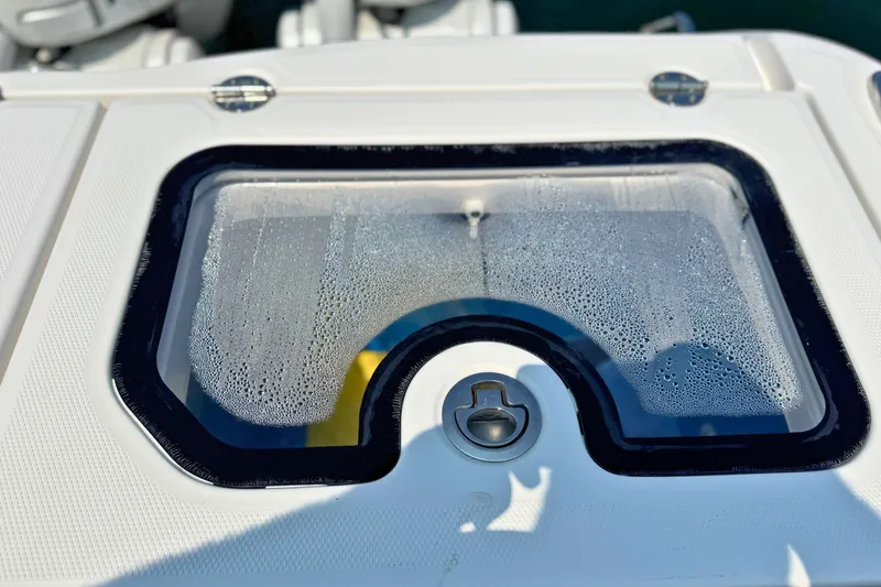 Slide: The Image of 2023 Everglades 455 Center Console livewell with condensation on the lid. - 68