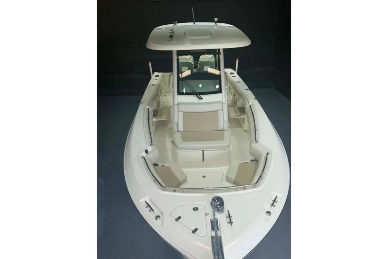 Slide: The Image of 2022 Boston Whaler 250 Outrage boat with spacious seating and sleek design. - 13
