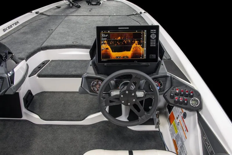 Slide: The Image of Manufacturer Provided Image: 2026 Skeeter ZXE21 boat dashboard with sonar display and control panel. - 7