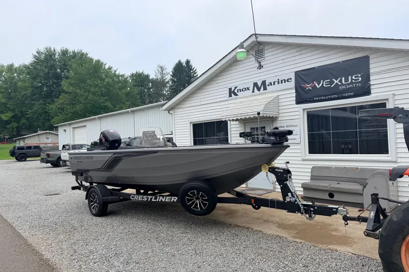Slide: The Image of 2027 Crestliner 1850 Kodiak SC boat on trailer at Knox Marine dealership. - 1