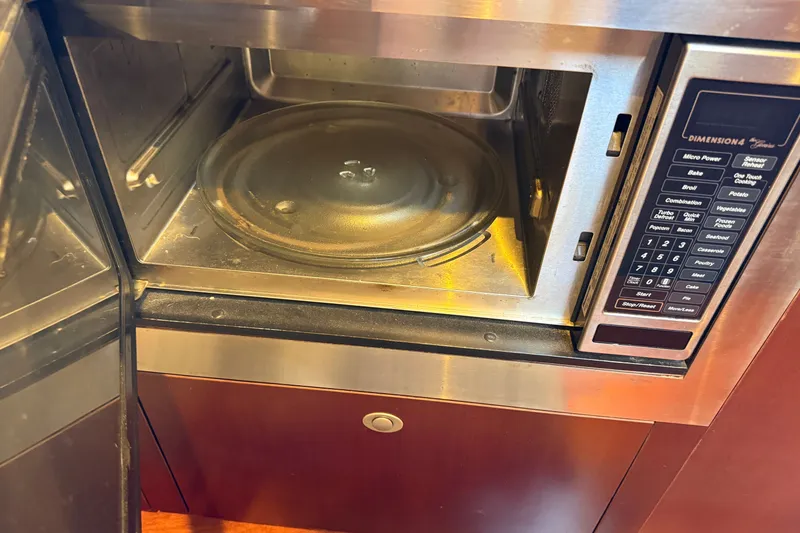 Slide: The Image of Built-in microwave oven on a 2005 Sea Ray 48 Sundancer yacht. - 72