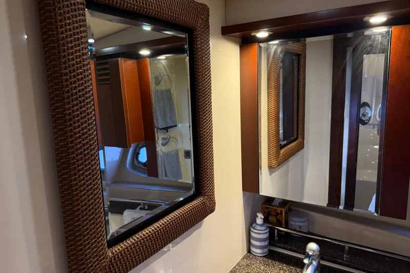 Slide: The Image of Luxurious bathroom interior of 2005 Sea Ray 48 Sundancer yacht with elegant mirrors. - 58