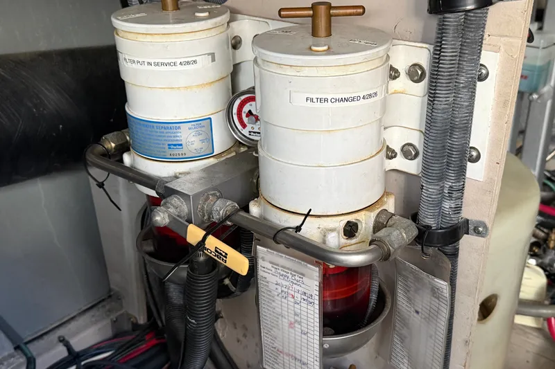 Slide: The Image of Fuel filters in the engine room of a 2005 Sea Ray 48 Sundancer yacht. - 112