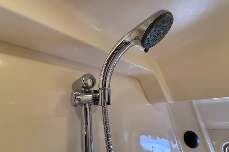 Slide: The Image of Chrome shower head in 2005 Sea Ray 48 Sundancer yacht bathroom. - 62