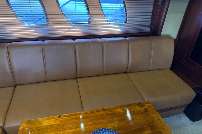 Slide: The Image of Luxurious leather seating in 2005 Sea Ray 48 Sundancer yacht interior. - 82