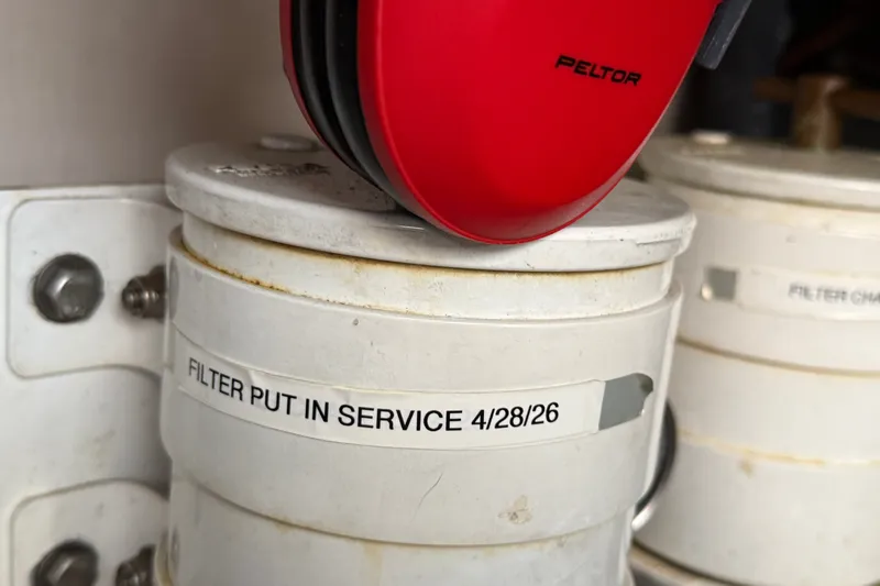 Slide: The Image of Red Peltor earmuffs on a labeled filter, Sea Ray 48 Sundancer, 2005 model. - 113