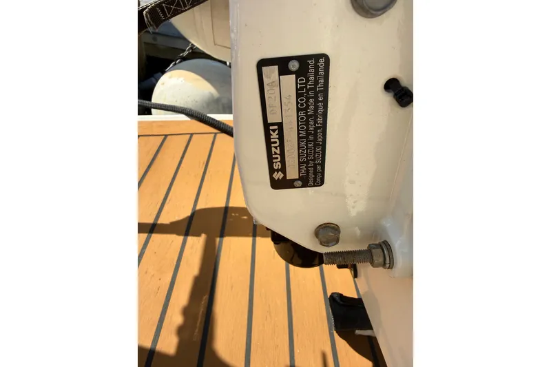 Slide: The Image of Close-up of Suzuki motor label on 2005 Sea Ray 48 Sundancer boat. - 7