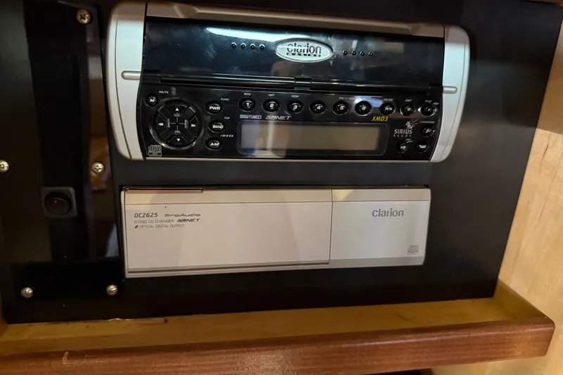 Slide: The Image of Clarion audio system in 2005 Sea Ray 48 Sundancer yacht, featuring CD changer and Sirius radio. - 87