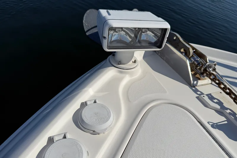 Slide: The Image of Bow of 2005 Sea Ray 48 Sundancer with spotlight and anchor chain. - 27