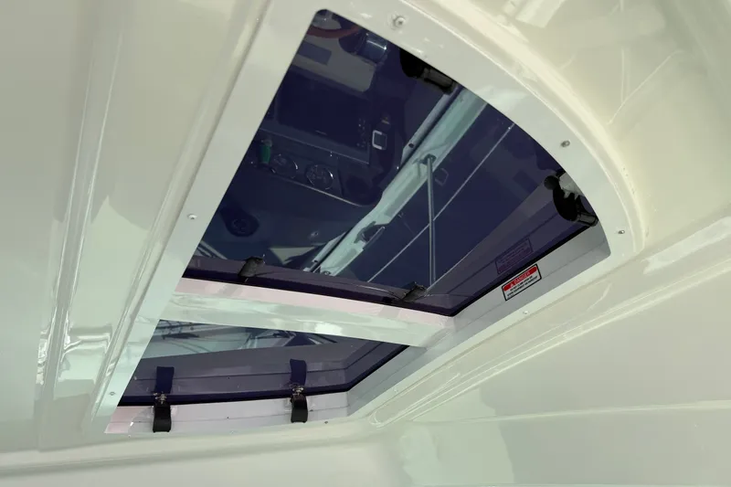 Slide: The Image of 2005 Sea Ray 48 Sundancer yacht interior with open sunroof view. - 44