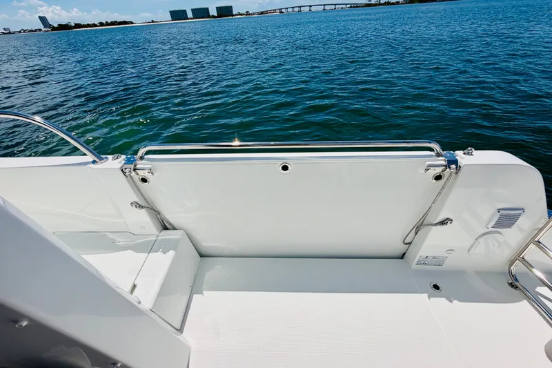 Slide: The Image of 2026 Beneteau Antares 11 boat deck with ocean view and railing. - 13