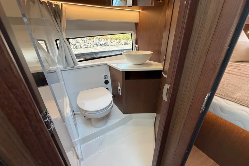 Slide: The Image of Modern bathroom interior of 2026 Beneteau Antares 11 yacht, featuring sleek design and amenities. - 32