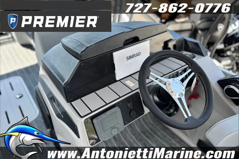 Slide: The Image of Steering console of 2027 Premier 250 Solaris Upper Deck - CL boat with Simrad display. - 10