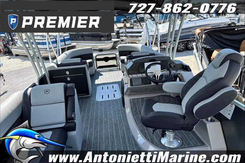 Slide: The Image of Premier 250 Solaris Upper Deck CL 2027 boat interior with seating and steering console. - 9
