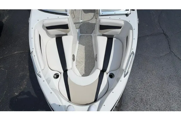 Slide: The Image of 2011 Glastron GT 205 boat interior with white and black seating. - 20
