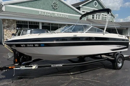 The Image of 2011 Glastron GT 205 boat on trailer at Reed's Marine dealership. - 1