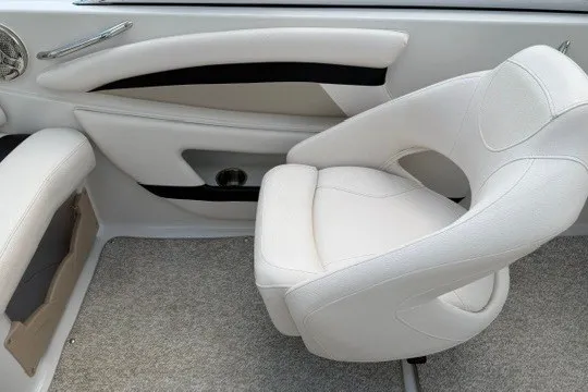 Slide: The Image of 2011 Glastron GT 205 boat interior with white seating and modern design. - 27