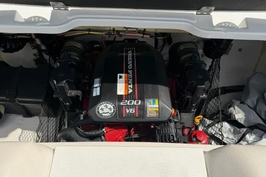 Slide: The Image of 2011 Glastron GT 205 boat engine compartment with V6 200 horsepower motor. - 30