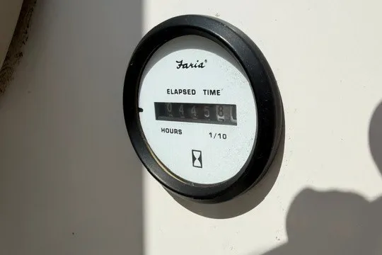 Slide: The Image of Hour meter on 2011 Glastron GT 205 boat showing 445.8 hours elapsed. - 14