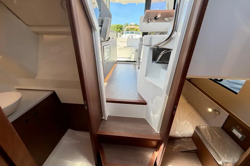 Slide: The Image of Interior view of 2026 Beneteau Antares 9, showcasing cabin and seating area. - 33