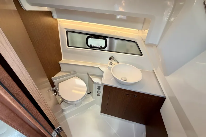 Slide: The Image of Modern bathroom interior of 2026 Beneteau Antares 9 yacht, featuring sleek design and compact amenities. - 22