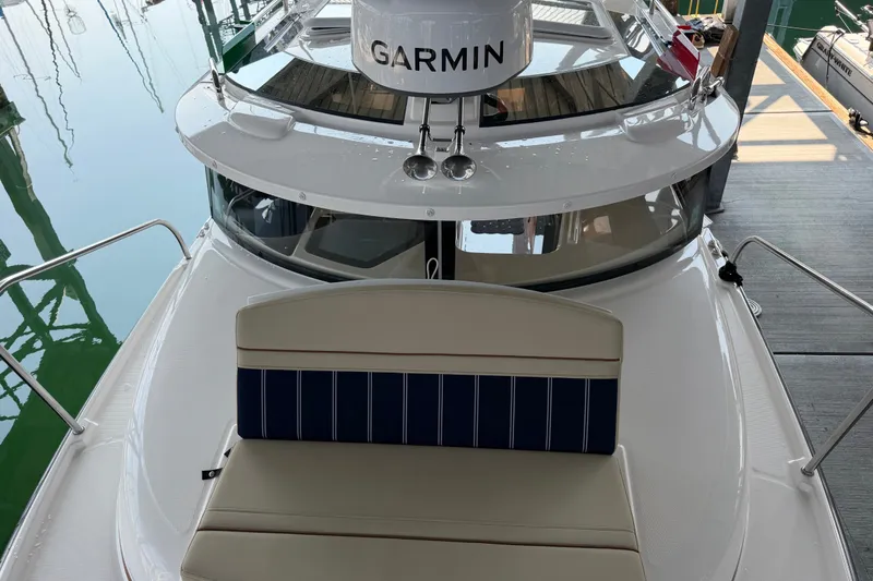 Slide: The Image of 2024 Ranger Tugs R-27 boat with Garmin radar, docked at marina. - 55
