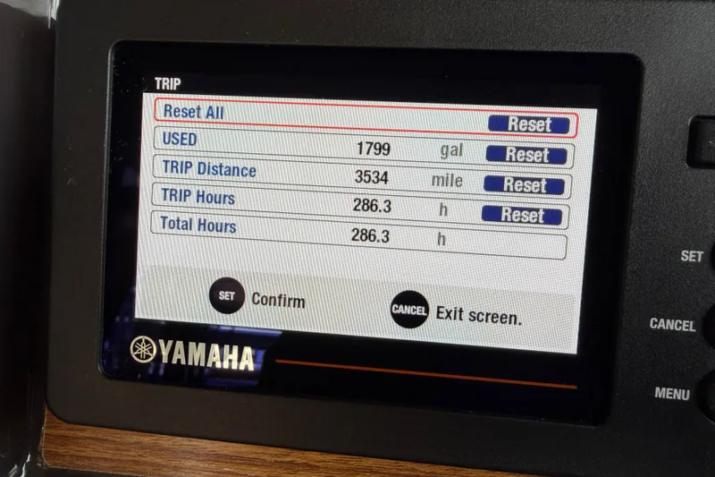 Slide: The Image of Yamaha trip display on 2024 Ranger Tugs R-27, showing fuel, distance, and hours. - 31