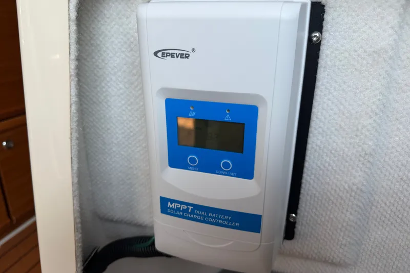Slide: The Image of MPPT solar charge controller in 2024 Ranger Tugs R-27 boat interior. - 53