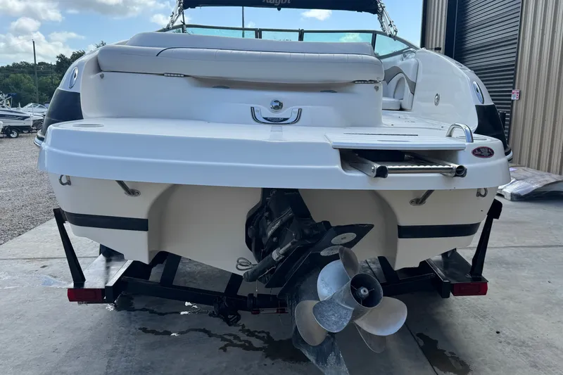 Slide: The Image of 2007 Kayot Z 220 boat rear view with propeller and swim platform. - 17