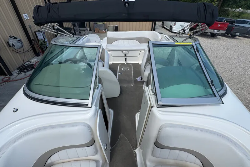Slide: The Image of 2007 Kayot Z 220 boat interior with open windshield and seating area. - 4