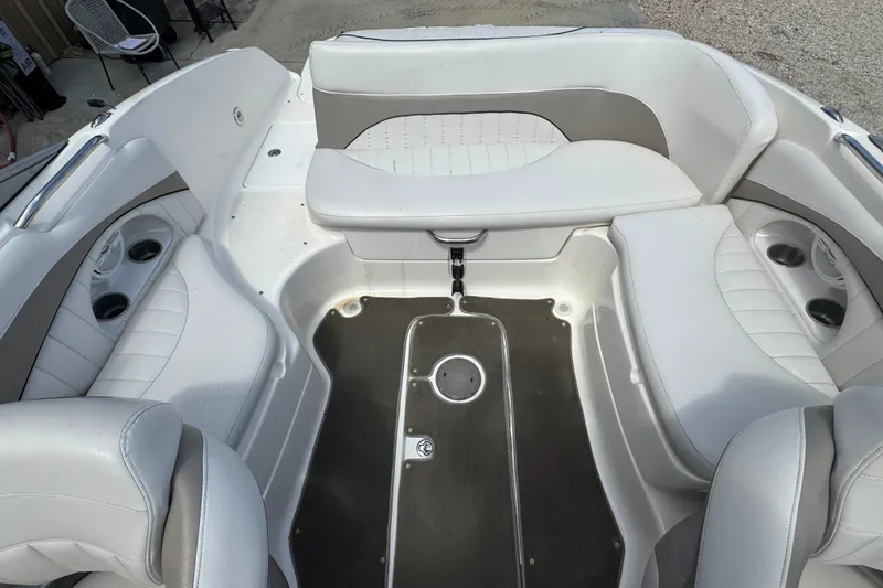Slide: The Image of 2007 Kayot Z 220 boat interior with white seating and cup holders. - 13
