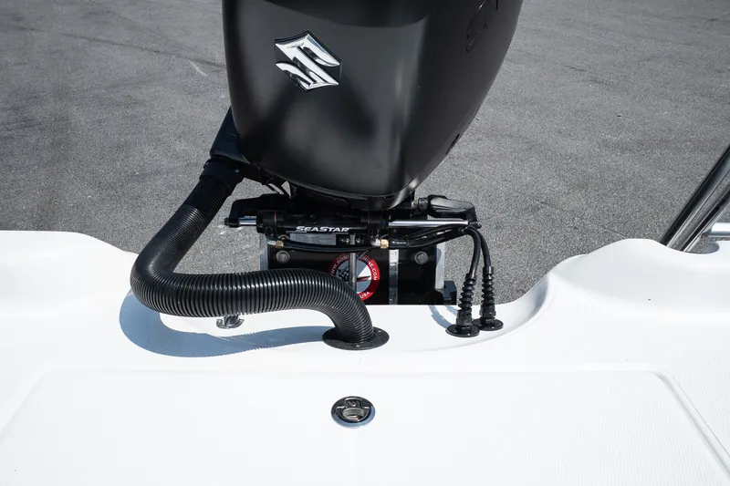 Slide: The Image of 2027 Blazer PureBay 2400 boat engine detail with SeaStar hydraulic steering system. - 15