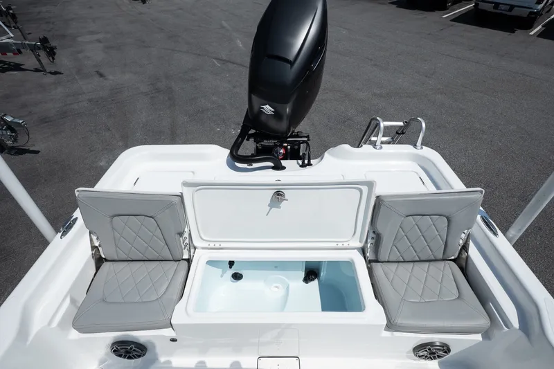 Slide: The Image of 2027 Blazer PureBay 2400 boat interior with seating and storage compartments. - 14