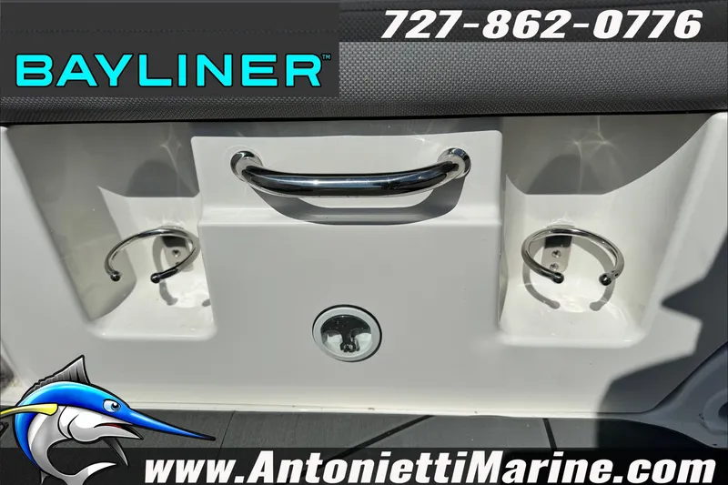 Slide: The Image of 2026 Bayliner D22 boat detail with chrome fixtures and branding. - 27